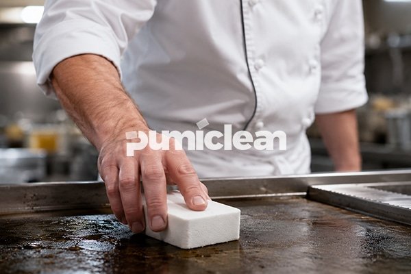 Grill brick application on commercial griddle surface